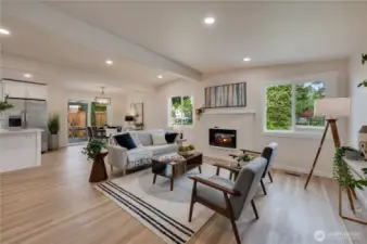 Open Great room area, new flooring, paint and 1/4 bath for guest