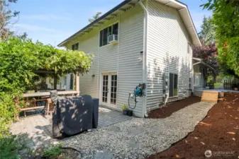 Side yard with French door entry to kitchen