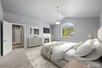 Primary bedroom w/ fireplace - virtually staged