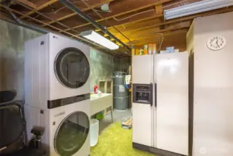 Laundry area plus utility sink & storage