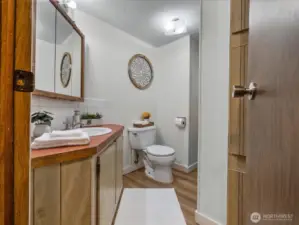 Guest bathroom with bathtub.