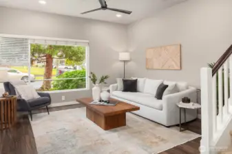 Ample living room area. Ceiling fan added.