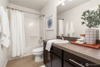 Full bathroom serving the additional bedrooms.