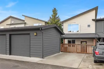 Secure garage and deeded parking space adjacent.