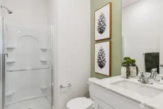 Shower is right next to the bedroom on the main level! Photo is for representation purposes only.