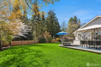 Fully fenced and level backyard that offer tranquility and privacy