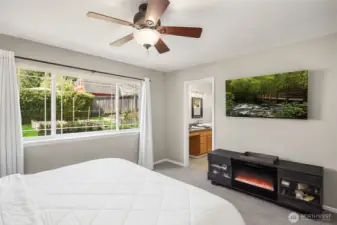 Spacious primary bedroom with large en-suite bathroom
