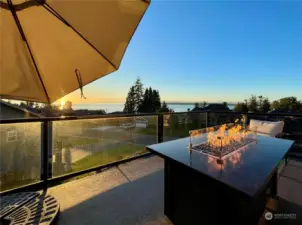 Deck showcases a Concrete top Gas fireplace.