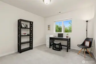 This room is staged as an office, but it is a bedroom with a full size closet.