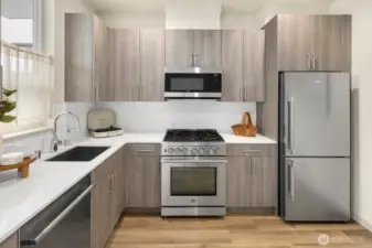 Quartz counters and Beko appliance package.