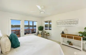 Spacious primary Bedroom with lake views