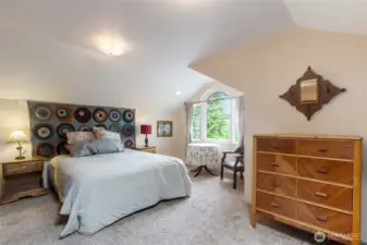 Upper-Level Office / Flex Room: This large, versatile space is currently being used as a private primary bedroom, offering flexibility to suit your lifestyle—whether as a home office, creative studio, or spacious private retreat or?