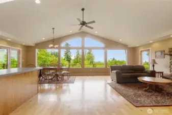 A striking wall of windows in the main living area greets you the moment you walk through the door, offering breathtaking views and an abundance of natural light.