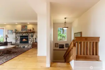 Featuring stunning hardwood floors, beautiful fir doors throughout the home, and upgraded recessed lighting, this living space showcases timeless quality and craftsmanship—details that are increasingly rare to find in today’s homes.