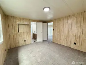 More of the guest bedroom, with access to the guest bathroom which shares with utility room.