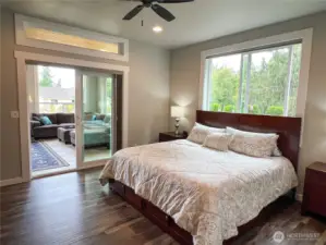 Primary suite opens to sunroom.