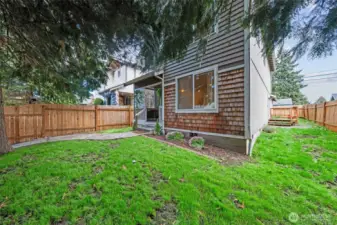 Front of home and side yard