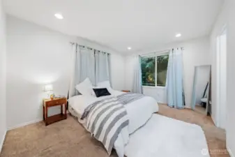 Large primary bedroom with large walk in closet and en suite