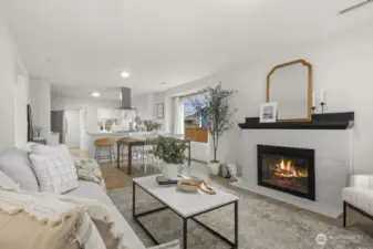 Living room with wood burning fireplace