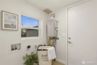 Laundry room and door to backyard