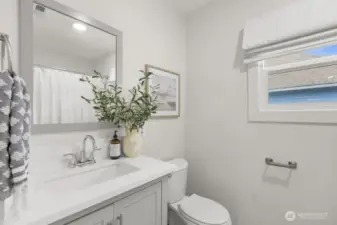 Full bathroom situated between the bedrooms