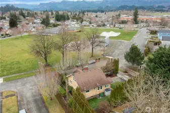 Drone shot of back side and park.