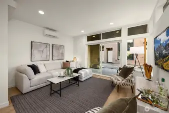 Floor-to-ceiling windows and soaring ceiling heights create an unparalleled sense of volume and light