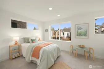 Bright and airy guest bathrooms feature clean lines, modern tile work, and elegant floating vanities