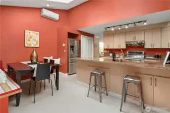 Kitchen has nook with breakfast bar