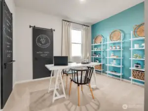 Main level bedroom/office. Photos are representational. Actual colors and finishes will vary. See site agent for details.