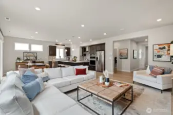 Spacious versatile great room to gather.  Photos are representational. Actual colors and finishes will vary. See site agent for details.