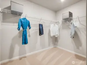 Primary walk-in closet is very large.  Photos are representational. Actual colors and finishes will vary. See site agent for details.
