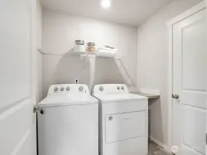 Very convenient upstairs utility room. Photos are representational. Actual colors and finishes will vary. See site agent for details.