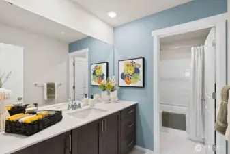 Hallway full bath with double vanity sink.  Photos are representational. Actual colors and finishes will vary. See site agent for details.