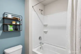 Shower and sink are separated by the door to accommodate multiple people getting ready at the same time. Photos are representational. Actual colors and finishes will vary. See site agent for details.