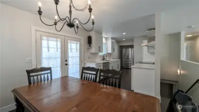 Nice large kitchen. Stairs to the lower level on right.