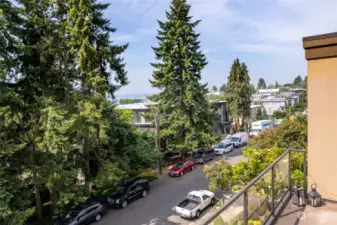 This home faces due south with territorial views from the main floor. Abundant sunlight floods the home- and one looks out at beautiful evergreen trees. This view is taken from the upper deck off of the primary bedroom.