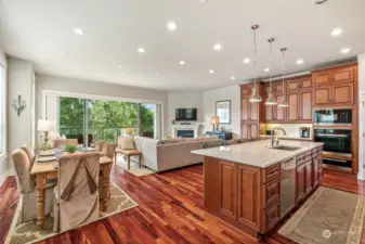 Fantastic great room! Ideal for entertaining with large room that spills out to deck. Beautiful wood floors and custom cabinetry.