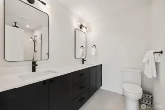 Spa-like primary bathroom - enjoy a double-sink vanity and heated tile floors!