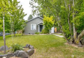 Lovely already landscaped front yard, mature trees providing privacy