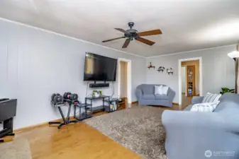 Extra long living room allows you to arrange this room in so many ways!  The layout options are endless!