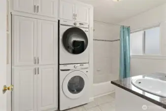 Beautifully updated tile bath surround, newer washer & Dryer with lots of storage