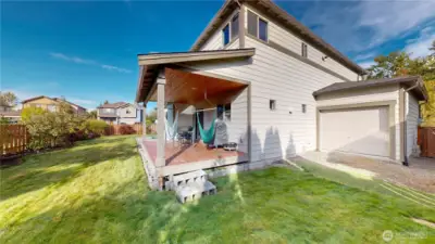 3-car garage with pass-through bay.
