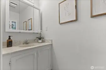 1/2 bath with 3 piece vanity mirror and bidet commode!