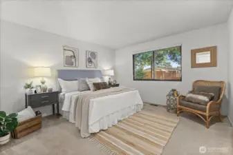 Really great sized secondary bedroom facing East, wonderful morning sunshine! All windows in the home have custom blinds and quad layered insulation