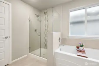 The spa-inspired owner’s En suite offers a true retreat with a luxurious five-piece bath designed for relaxation. Enjoy a soaking tub, separate shower, dual sinks, and elegant finishes that create a calming, rejuvenating space to start and end your day.