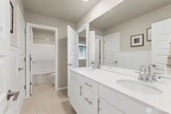 Jack and Jill bath located between both upstairs bedrooms offers a practical and convenient access from both rooms while still available for guest use.