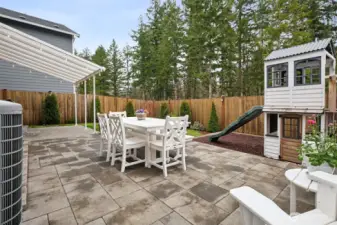 Enjoy peaceful evenings overlooking the protected greenbelt. Nature becomes part of your everyday view. Playhouse stays!