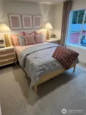 Bedroom 2 of model home. Finishes and features may vary.