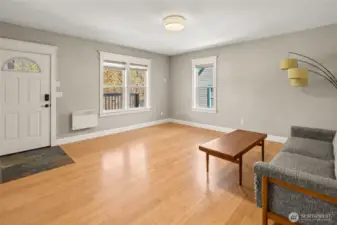 Slate font entry leads to the large living space with bamboo floors.